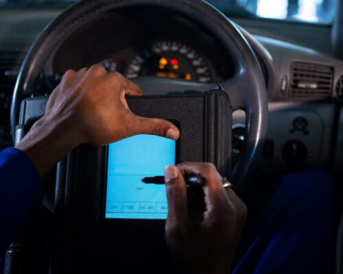 mechanic-using-touchscreen-device mechanic-using-touchscreen-device
